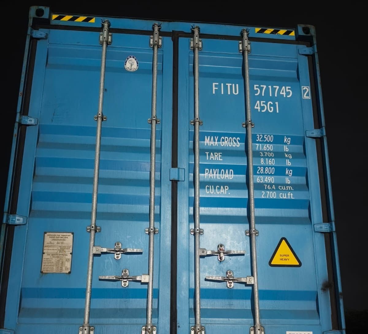 Rear doors and locking gear of a loaded shipping container
