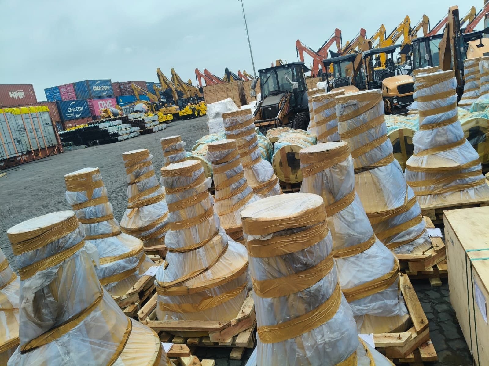 Packed industrial cargo laid out in a yard for measurement